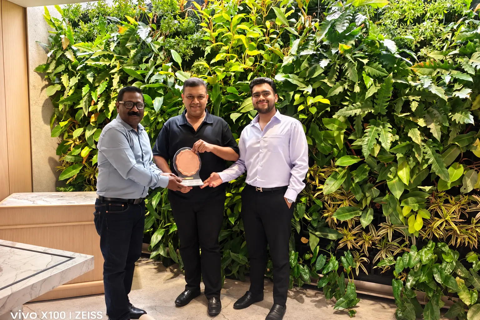 Corporate Team Award in a Lush Green Lobby